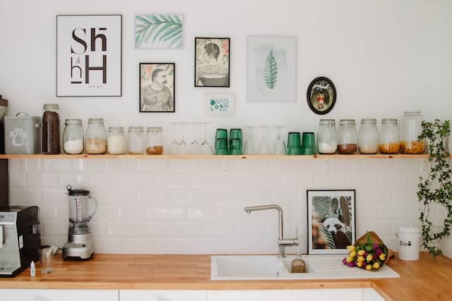 kitchen shelf with glasses and jars