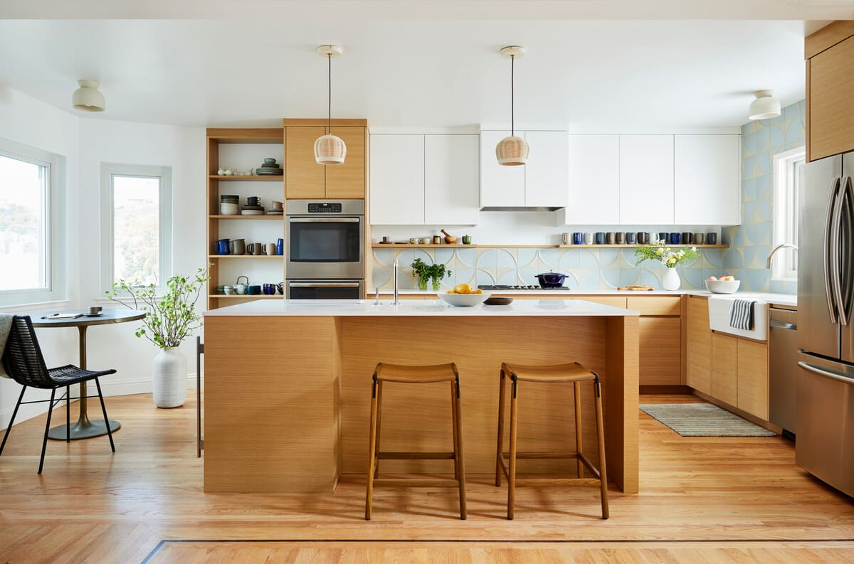 Maximize space by merging the living room and kitchen